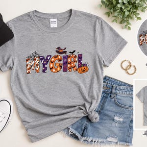 Camiseta "Minha Menina" | Letras de Halloween com teias de aranha, morcegos e abóboras | Temporada assustadora | Outono | Camiseta de Halloween | Presente personalizado
