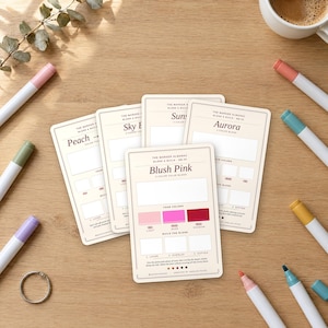 May include: Four rectangular marker blending guide cards labeled The Marker Almanac, featuring color palettes like Blush Pink, Peach, Sky Blue, and Aurora. Each card includes sections for light, base, and shadow colors, with blank boxes for testing layers, overlaps, and softening techniques.