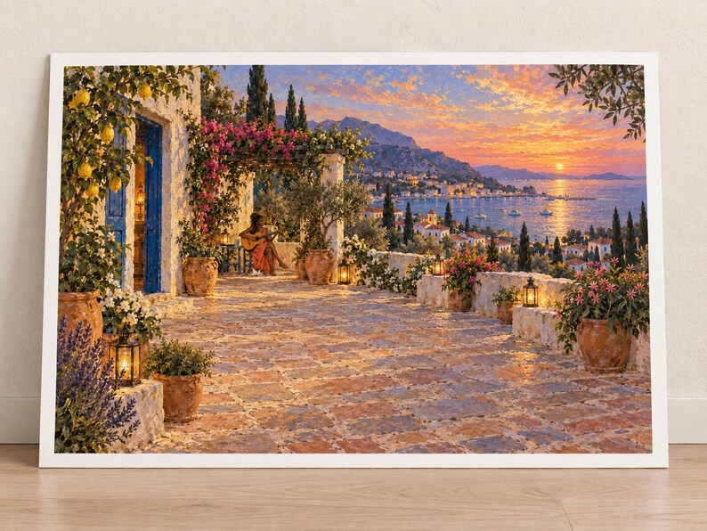 May include: A framed landscape painting depicting a Mediterranean stone terrace at sunset. The scene features terracotta pots with flowers, a lemon tree, a person playing a guitar under a pergola, and a coastal view with a harbour and mountains.