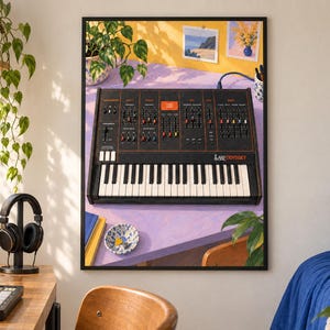 May include: A framed wall art print depicting an ARP Odyssey analog synthesizer with a black chassis, orange text, and a white and black keyboard. The synthesizer is set on a light purple desk surface with a small bowl and books nearby.