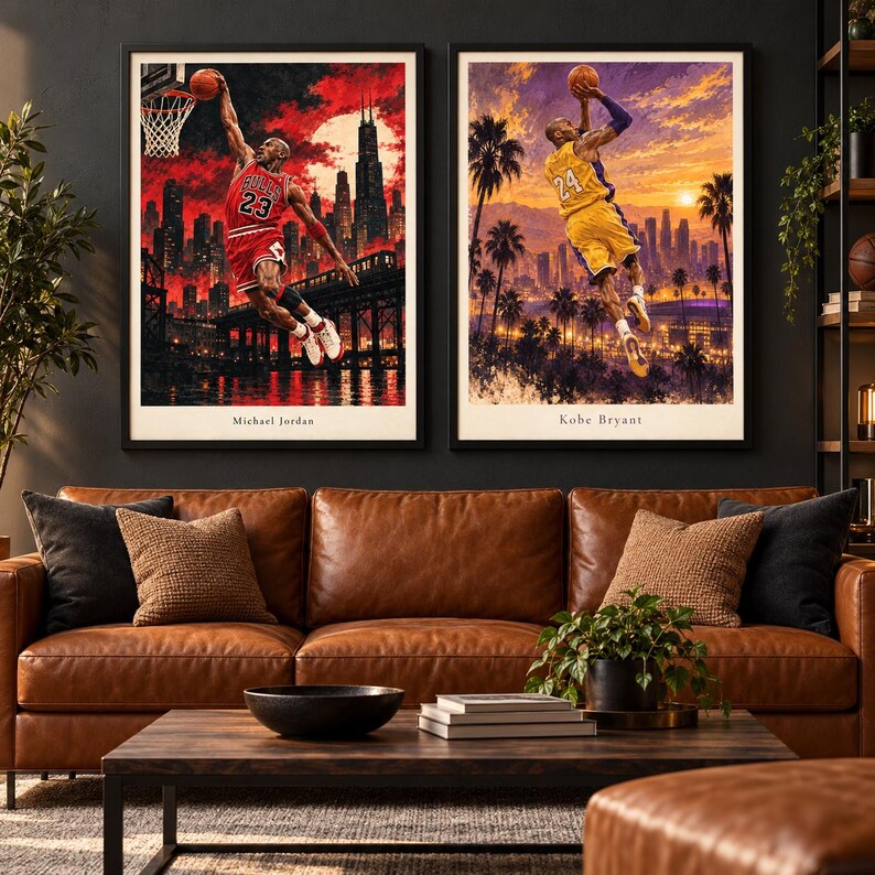 May include: Two framed wall art prints featuring basketball players. The left print shows Michael Jordan in a red jersey dunking against a Chicago skyline. The right print shows Kobe Bryant in a yellow jersey shooting against a Los Angeles sunset.
