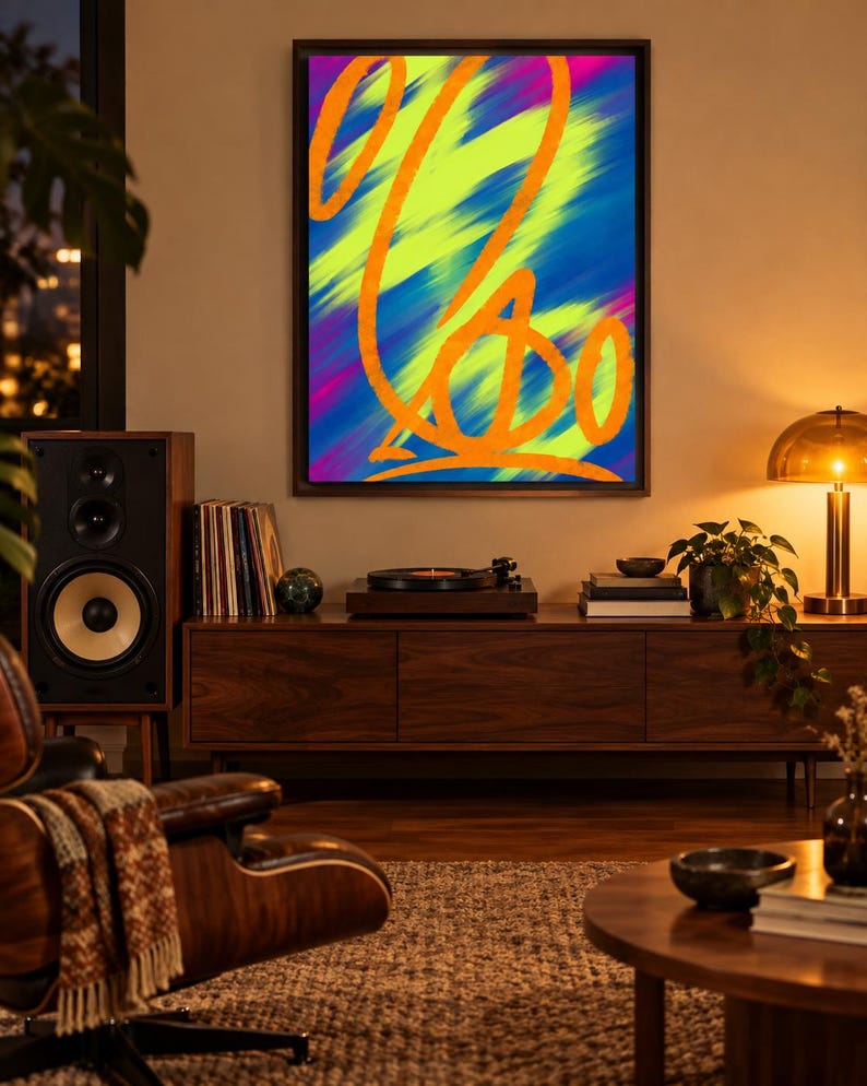 May include: A rectangular framed wall art piece featuring a vibrant abstract composition. The artwork displays bold, sweeping orange calligraphic lines layered over a dynamic background of blended neon yellow, deep blue, and magenta brushstrokes.