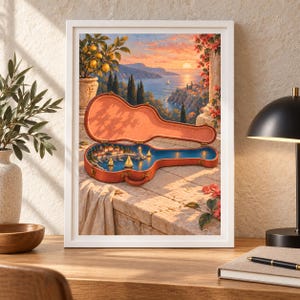 Puede incluir: Una l&aacute;mina enmarcada que muestra un estuche de guitarra abierto sobre una terraza de piedra. El interior del estuche presenta una escena costera en miniatura con un puerto, veleros y un faro al atardecer, frente a un mar mediterr&aacute;neo.