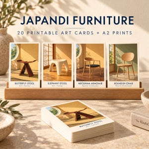 May include: A set of 20 printable art cards and A2 prints titled JAPANDI FURNITURE. The cards feature images of furniture including the Butterfly Stool, Elephant Stool, Hiroshima Armchair, and Roundish Chair, displayed in a wooden stand.