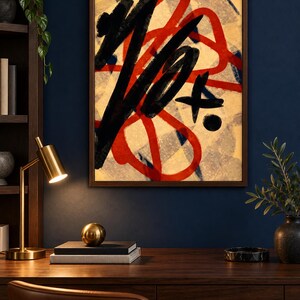 May include: A framed abstract wall art print featuring bold, thick black brushstrokes layered over vibrant red looping lines. The background consists of a textured, light beige surface with subtle blue accents, all enclosed within a dark brown frame.