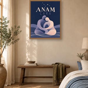 May include: A framed rectangular wall art print featuring a dark blue background with the text ANAM CARA in white capital letters. Below the text, two stylized figures in shades of purple and light pink are embracing, set against wavy lines.
