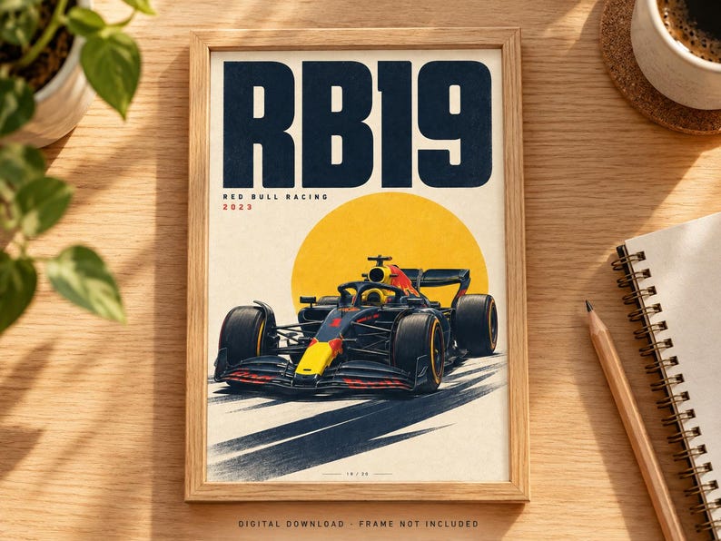 May include: A framed poster featuring a dark blue and yellow Red Bull Racing RB19 Formula 1 car centered against a large yellow circle. The text RB19 is printed in large dark blue letters at the top, with Red Bull Racing 2023 printed below.