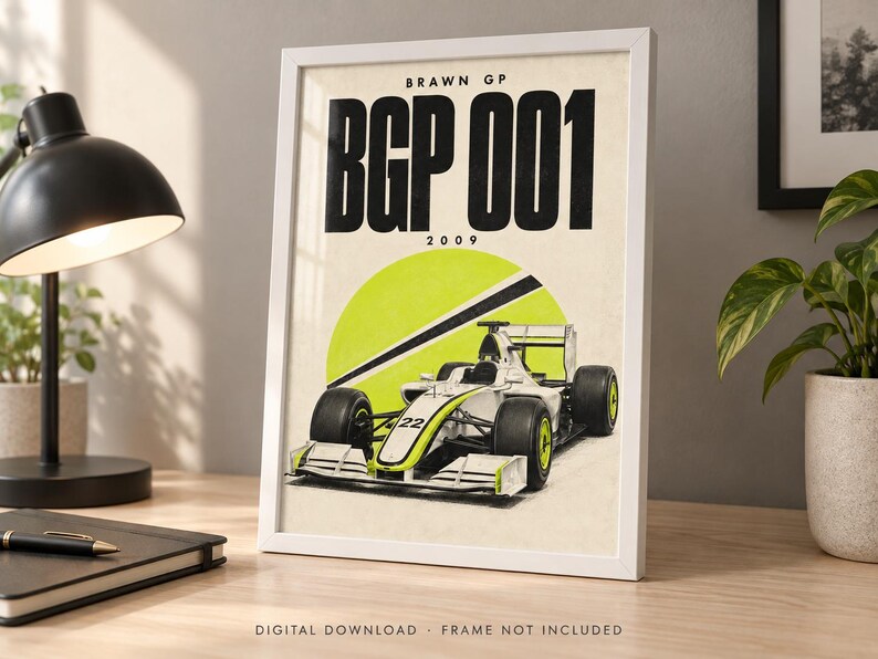 May include: A framed poster featuring a white and neon yellow Brawn GP BGP 001 Formula 1 race car with the number 22. The text BRAWN GP, BGP 001, and 2009 is printed in black at the top. The background is a cream color with a large neon yellow circle.