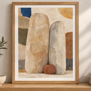 May include: A framed wall art print featuring an abstract composition of two large, textured, beige and gray stone-like vertical forms alongside a smaller, rounded, terracotta-colored stone, set against a background of muted color blocks.