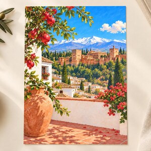 May include: A rectangular print depicting a Mediterranean terrace with a large terracotta amphora, a pomegranate tree, and red flowers. In the background, a historic fortress complex sits on a hill before snow-capped mountains under a blue sky.