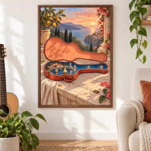 Puede incluir: Una impresi&oacute;n art&iacute;stica enmarcada que muestra un estuche de guitarra abierto sobre una terraza de piedra. El interior del estuche revela una escena costera en miniatura con un puerto, veleros y un faro al atardecer, reflejando el paisaje de fondo.