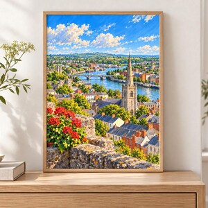 May include: A framed landscape painting depicting a town with a stone church spire, a river, and a bridge under a bright blue sky with white clouds. In the foreground, a stone wall is adorned with vibrant red geranium flowers in full bloom.