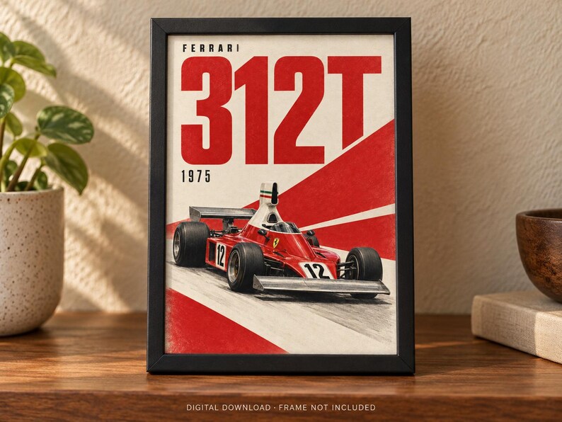 May include: A framed poster featuring a red Ferrari 312T Formula One race car from 1975. The artwork displays the text FERRARI 312T 1975 in bold red letters above the car, which bears the number 12 on its front nose and side body panels.
