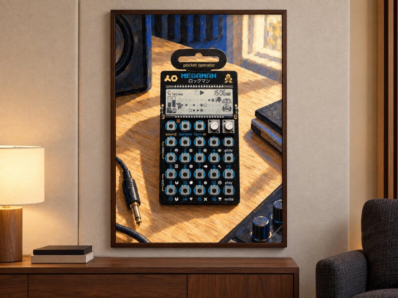 May include: A black Teenage Engineering Pocket Operator synthesizer featuring a Megaman graphic, a digital LCD screen, and a grid of sixteen circular buttons with blue accents. The device displays the text Pocket Operator and Megaman.