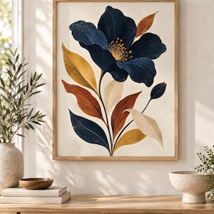 May include: A framed wall art print featuring a large, dark blue flower with a yellow centre, surrounded by stylised leaves in shades of deep blue, burnt orange, mustard yellow, and cream, all set against a neutral, off-white background.