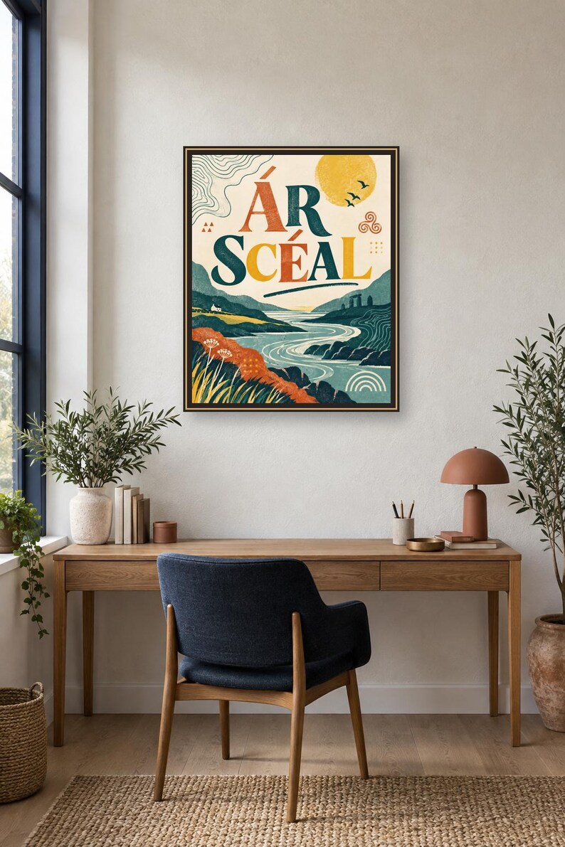 May include: A framed rectangular wall art print featuring a landscape illustration with a winding river, rolling hills, and a yellow sun. The text &Aacute;R SC&Eacute;AL is printed in large, bold, dark blue and orange letters at the top center of the artwork.