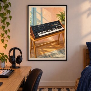 May include: A framed wall art print depicting a black analogue synthesiser with wooden side panels resting on a wooden stand. The keyboard features black and white keys, numerous circular control knobs, and the text PolySix printed on the front panel.