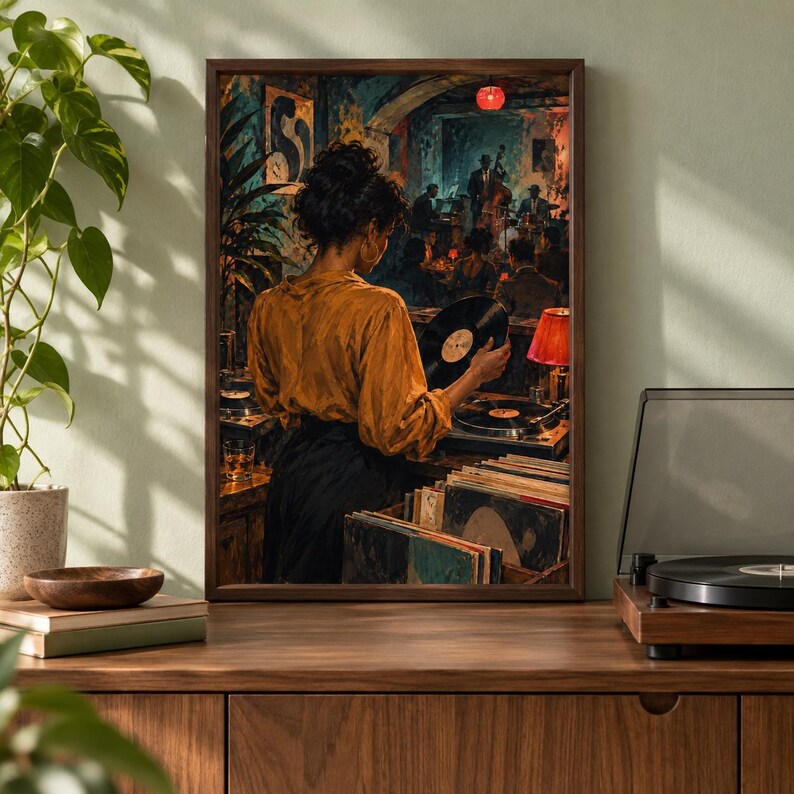 May include: A framed wall art print depicting a person in a mustard yellow shirt and black skirt standing in a dimly lit jazz club, holding a black vinyl record near a turntable, with stacks of records and a red lamp visible in the background.