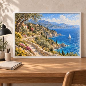 May include: A framed landscape painting depicting a coastal scene with a stone path winding along a cliffside, vibrant yellow and pink flowers, olive trees, a distant village, blue sea, and a white sailboat under a bright, clear sky.
