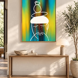 May include: A rectangular framed wall art piece featuring a vibrant vertical gradient background of blue, yellow, and dark brown. A white line drawing of a face with a stacked stone-like shape on top is centered on the canvas within a wooden frame.
