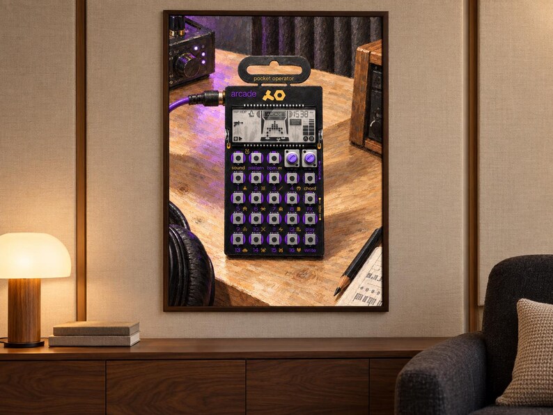 May include: A black Teenage Engineering PO-20 Arcade pocket operator synthesizer featuring a digital LCD screen, a grid of small square buttons with purple accents, two rotary knobs, and a purple audio cable plugged into the side port.