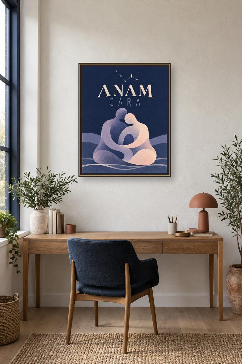 May include: A rectangular wall art print in a dark frame featuring the text ANAM CARA in cream lettering. Below the text, two stylized figures in shades of purple and peach are depicted in an embrace against a dark blue background with stars.