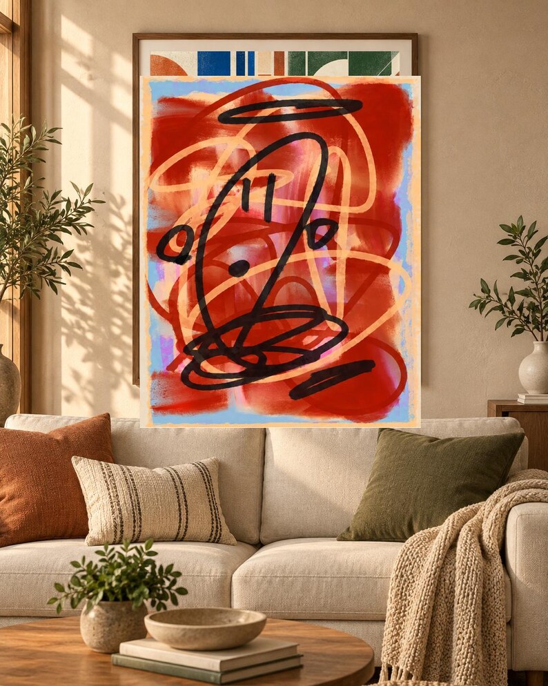 K&ouml;nnte beinhalten: Ein rechteckiger Wandkunstdruck mit einer abstrakten Komposition aus kr&auml;ftigen roten und orangefarbenen Fl&auml;chen, &uuml;berlagert von dicken schwarzen gestischen Linien und Schleifen, vor einem wei&szlig;en Hintergrund mit hellblauem Rand, gerahmt.
