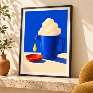 May include: A framed art print featuring a vibrant blue pitcher filled with fluffy white clouds. A single golden yellow drop falls from the pitcher spout into a small, shallow red bowl set on a light beige surface against a deep blue background.