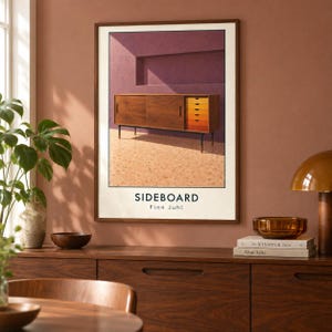 May include: A framed wall art print featuring a wooden sideboard with sliding doors and a column of six drawers in a gradient of orange tones. The print includes the text SIDEBOARD and Finn Juhl in black lettering against a light background.
