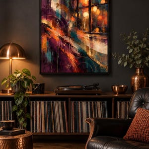 May include: A rectangular framed wall art piece featuring an abstract composition with bold strokes of deep purple, vibrant orange, and teal. The artwork depicts a stylized urban scene with glowing circular light orbs and dark vertical lines.