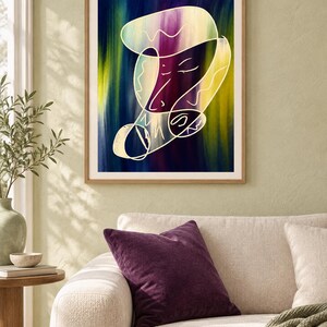 May include: A framed wall art print featuring an abstract composition with a continuous white line drawing of a face layered over a vertical gradient background of deep blue, purple, and bright yellow-green brushstrokes in a light wood frame.