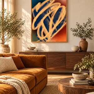 May include: A rectangular framed wall art piece featuring abstract, thick, sweeping brushstrokes in a light cream colour layered over a deep navy blue and burnt orange background, displayed in a wooden frame with a clean, simple border design.