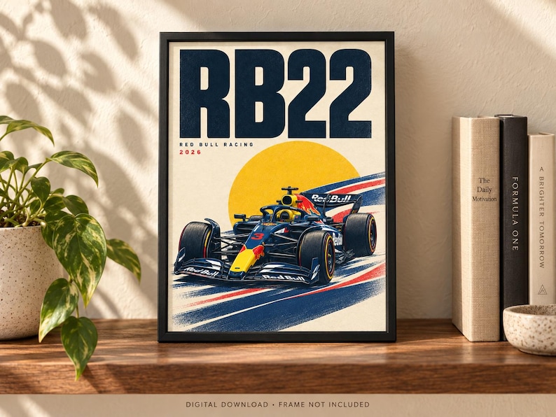 May include: A framed poster featuring a dark blue and yellow Red Bull Racing Formula One car, labeled RB22 and 2026, set against a large yellow sun and stylized red, white, and blue racing stripes on a cream background with bold dark blue text.
