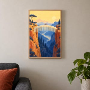 May include: A framed wall art print depicting a surreal landscape where a large, light-colored hair comb serves as a bridge between two orange rocky cliffs. A small bicycle is positioned on the comb, set against a yellow sky and blue valley.