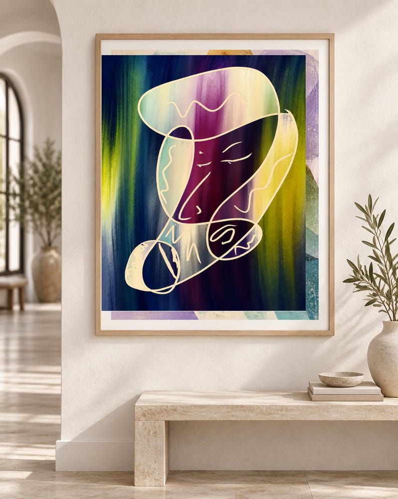 May include: A framed wall art print featuring an abstract composition with a central white line drawing of a face. The background consists of vertical brushstrokes in deep blue, purple, and yellow hues, enclosed within a light wood frame.