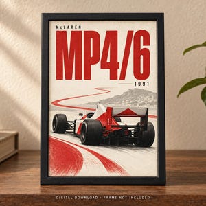 May include: A framed poster featuring a red and white McLaren MP4/6 Formula One race car from 1991 on a track. The text reads McLaren MP4/6 1991. The artwork shows the car from the rear, with a red winding track line leading toward a distant hill.