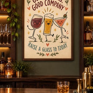 May include: A framed wall art print featuring a cream background with the text Good Drinks, Good Company and Raise a Glass to Today. The illustration depicts a cartoon wine glass, beer mug, and martini glass with faces, arms, and legs.
