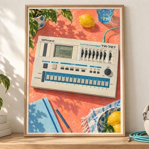 May include: A framed art print featuring a vintage Roland TR-727 Rhythm Composer drum machine on a bright orange surface. The image includes a blue notebook, a pen, two yellow lemons, a glass of water, and a green plant in a patterned pot.