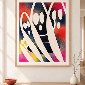 May include: A framed abstract wall art print featuring a vibrant, spray-painted background in gradients of red, pink, yellow, and dark blue. Overlaid on this colorful base are bold, sweeping, off-white curved lines and circular shapes.