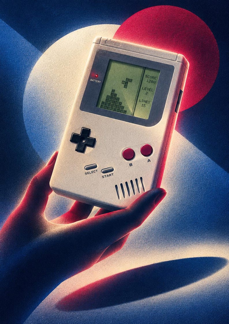 May include: A handheld gaming console in a light gray casing with a black directional pad, two red buttons labeled A and B, and gray Select and Start buttons. The screen displays a block puzzle game with text reading SCORE 1200, LEVEL 2, and LINES 15.