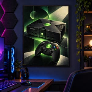 May include: A framed wall art print featuring a black original Xbox console and a matching controller. The design showcases the iconic green glowing X logo on both the console and the controller, set against a dark background with green light.