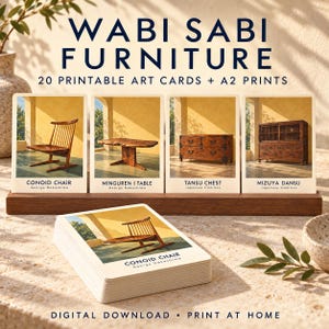 May include: A set of 20 printable art cards and A2 prints titled WABI SABI FURNITURE. The cards feature images of a Conoid Chair, Minguren I Table, Tansu Chest, and Mizuya Dansu. A wooden stand holds four cards, with a stack of cards in the foreground.