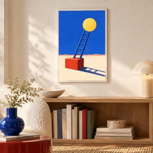 May include: A framed wall art print featuring a vibrant blue sky above a beige desert landscape. A red cube sits on the sand, supporting a blue ladder that reaches toward a large, bright yellow circle representing the sun in the upper center.