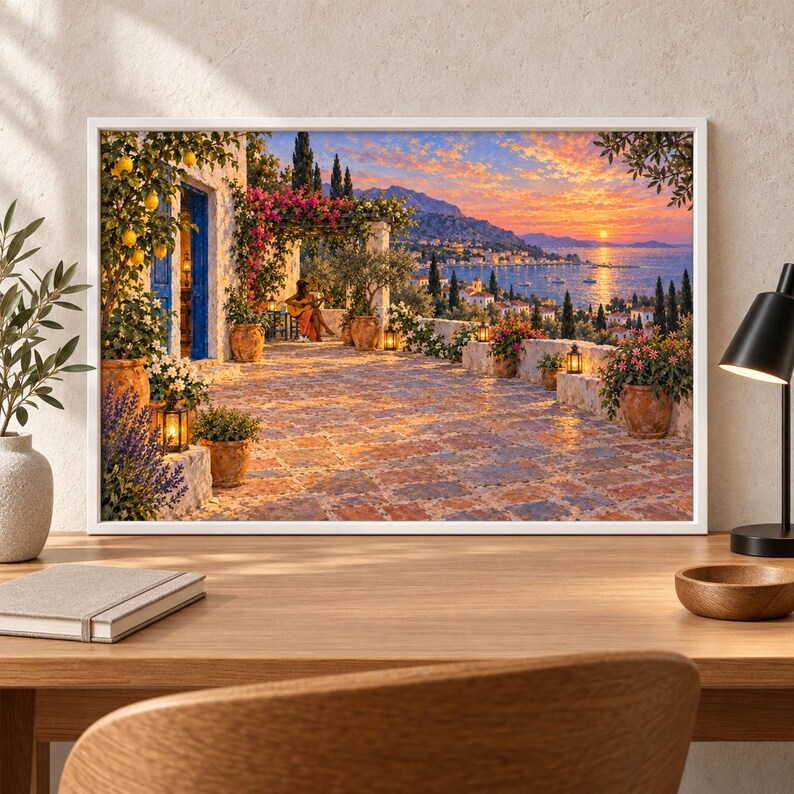 May include: A framed landscape print depicting a Mediterranean terrace at sunset. The scene features a tiled patio with potted lemon trees, pink bougainvillea, and lanterns. A person sits playing a guitar under a pergola overlooking a coastal town.
