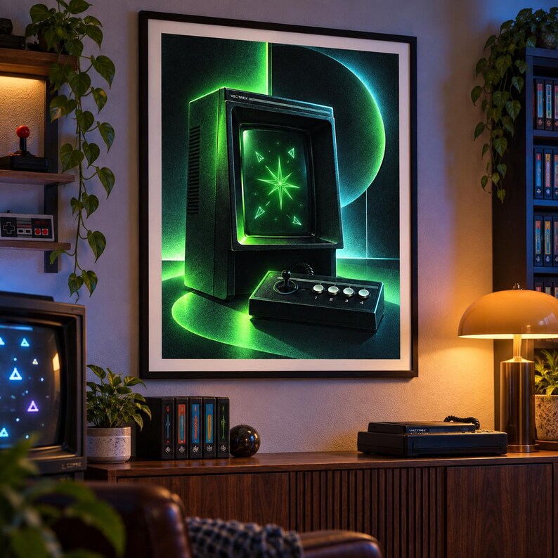 Puede incluir: Una impresi&oacute;n de arte de pared enmarcada que presenta un monitor de computadora vintage negro y un controlador de joystick a juego. La pantalla muestra un gr&aacute;fico verde brillante en forma de estrella con formas triangulares m&aacute;s peque&ntilde;as.