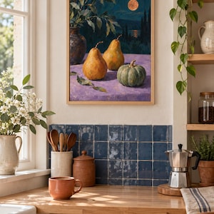 May include: A framed rectangular wall art print featuring an oil painting of two yellow pears and a green pumpkin resting on a purple surface. The background depicts a dark night landscape with a full moon, trees, and a vase with leafy branches.