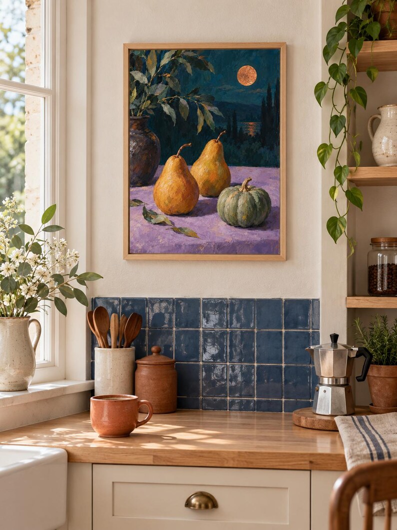 May include: A framed rectangular wall art print featuring an oil painting of two yellow pears and a green pumpkin resting on a purple surface. The background depicts a dark night landscape with a full moon, trees, and a vase with leafy branches.