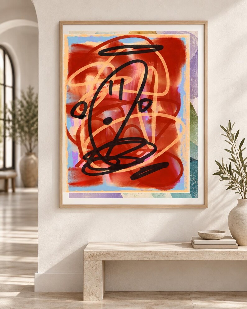 K&ouml;nnte beinhalten: Ein gerahmter abstrakter Wandkunstdruck mit kr&auml;ftigen, geschichteten Pinselstrichen in Dunkelrot, Hellblau und sanftem Orange. Die Komposition ist mit dicken, schwarzen, gestischen, tintenartigen Kritzeleien und Kreisformen &uuml;berlagert.
