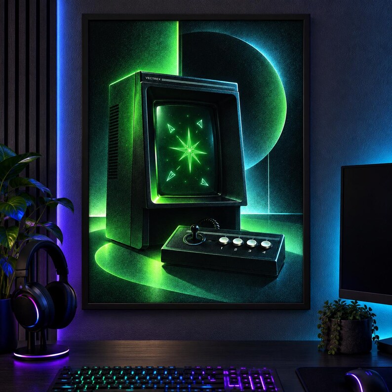 Puede incluir: Una impresi&oacute;n de arte mural enmarcada que presenta una consola de juegos Vectrex vintage con una pantalla verde brillante que muestra un gr&aacute;fico de estrella y formas geom&eacute;tricas, acompa&ntilde;ada de un controlador negro con cuatro botones y un joystick.