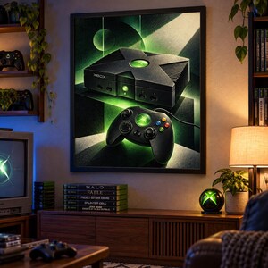 May include: A framed wall art print featuring a black original Xbox console and a matching controller. The artwork displays a glowing green aesthetic with geometric shapes and light beams, highlighting the iconic Xbox logo on both devices.
